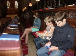 winter kids in church texting